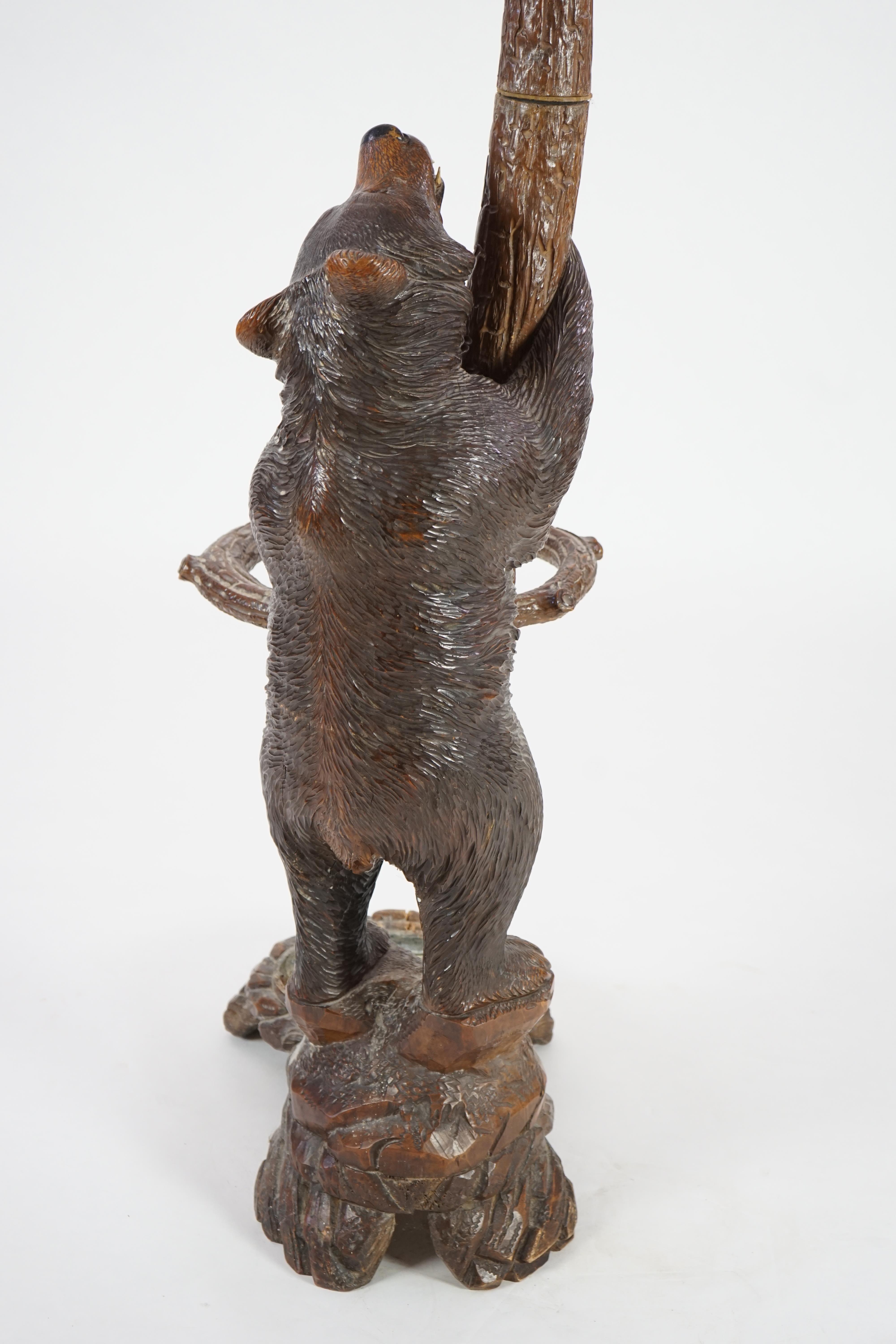 A 19th century Black Forest carved wood bear and cub hall stand